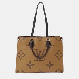 Louis Vuitton: Коричневая сумка-шоппер 