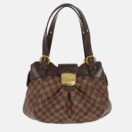 Louis Vuitton: Коричневая сумка 