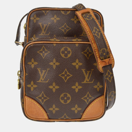Louis Vuitton: Коричневая сумка через плечо 