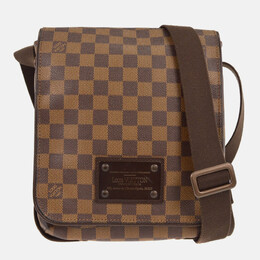 Louis Vuitton: Коричневая сумка 