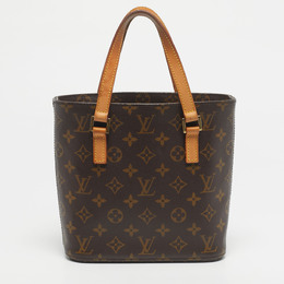 Louis Vuitton: Коричневая сумка 