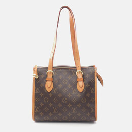 Louis Vuitton: Коричневі сумки шопери 