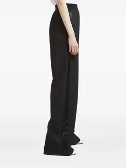 Maison Margiela: Чёрные брюки 