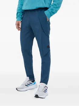 adidas: Голубые брюки 