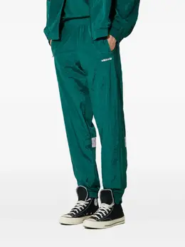 adidas: Зелёные брюки 