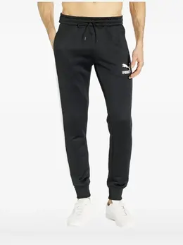 PUMA: Чёрные брюки  Iconic T7