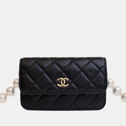 Chanel: Чорні клатчі 