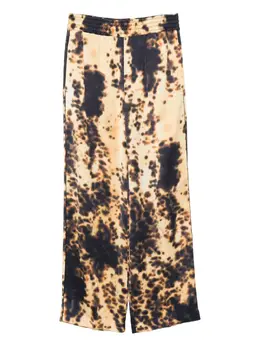 Victoria Beckham: Тёмные брюки 