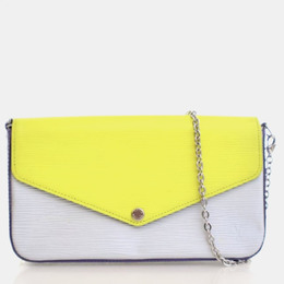 Louis Vuitton: Жёлтая сумка  Pochette