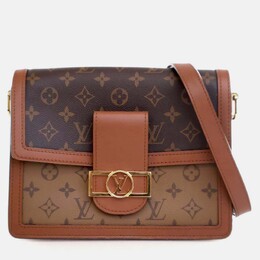 Louis Vuitton: Коричневая сумка 