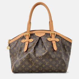 Louis Vuitton: Коричневая сумка 