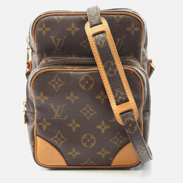 Louis Vuitton: Коричневая сумка через плечо 