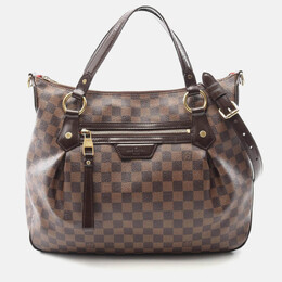 Louis Vuitton: Коричневая сумка 