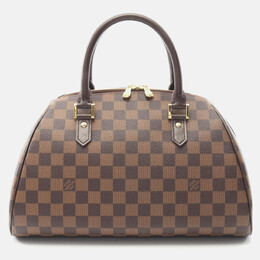 Louis Vuitton: Коричневая сумка 