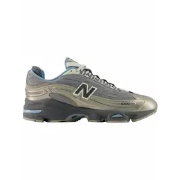 New Balance: Коричневые кроссовки 