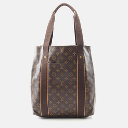 Louis Vuitton: Коричневі сумки шопери 