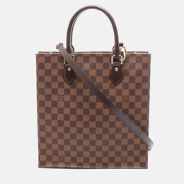 Louis Vuitton: Коричневі сумки шопери 