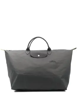 Longchamp: Зелёная дорожная сумка  Le Pliage Green