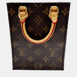 Louis Vuitton: Коричневі сумки шопери 