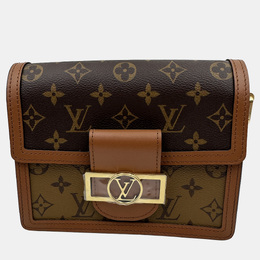 Louis Vuitton: Коричневая сумка 