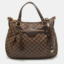 Louis Vuitton: Коричневая сумка 