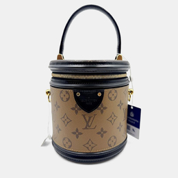 Louis Vuitton: Коричневая сумка 