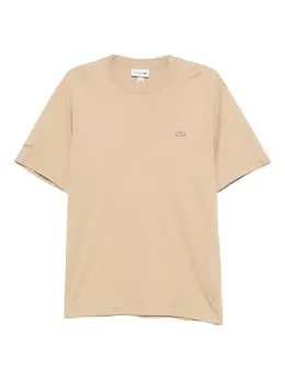 Lacoste: Бежевая футболка 