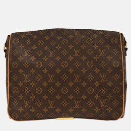 Louis Vuitton: Коричневая сумка 