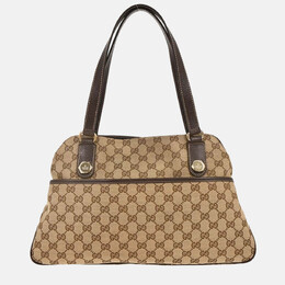 Gucci: Бежеві сумки шопери  GG