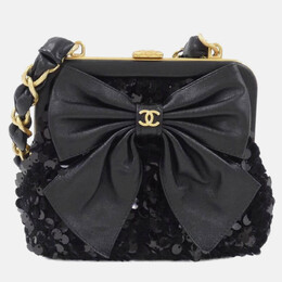 Chanel: Чорні клатчі 