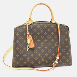Louis Vuitton: Коричневая сумка 