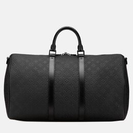 Louis Vuitton: Чорні сумки  Keepall