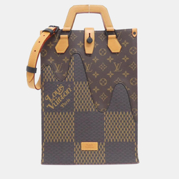 Louis Vuitton: Коричневая сумка-шоппер 