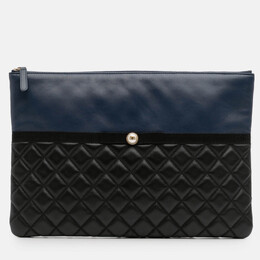 Chanel: Чорні клатчі 