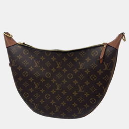 Louis Vuitton: Коричневая сумка 