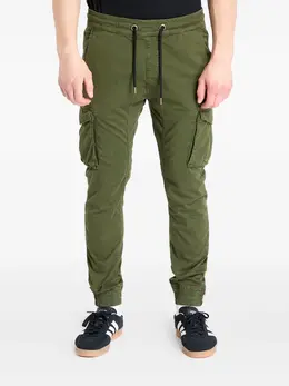 Alpha Industries: Зелёные брюки 