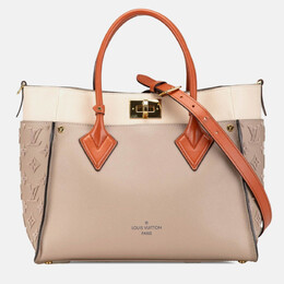 Louis Vuitton: Серая сумка 