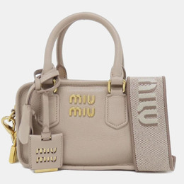 Miu Miu: Бежеві сумки 