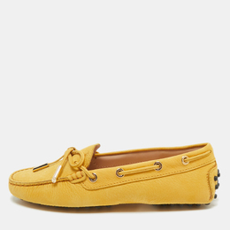 Tod's: Жёлтые лоферы  Gommino