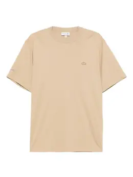 Lacoste: Бежевая футболка 
