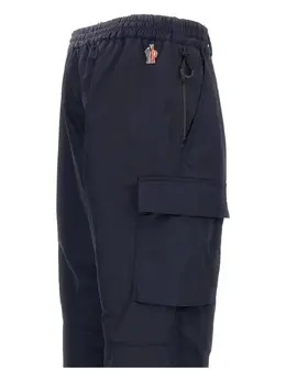 Moncler Grenoble: Голубые брюки 