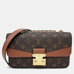 Louis Vuitton: Коричневая сумка 