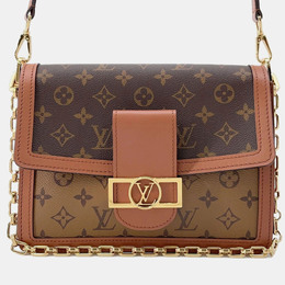 Louis Vuitton: Коричневая сумка 
