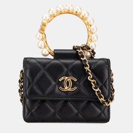 Chanel: Чорні клатчі 