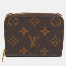 Louis Vuitton: Коричневый кошелёк  Zippy