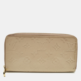Louis Vuitton: Бежевый кошелёк  Zippy