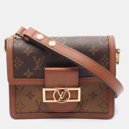 Louis Vuitton: Коричневая сумка 