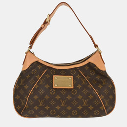 Louis Vuitton: Коричневая сумка 