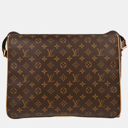 Louis Vuitton: Коричневая сумка 