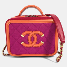 Chanel: Помаранчеві сумки 